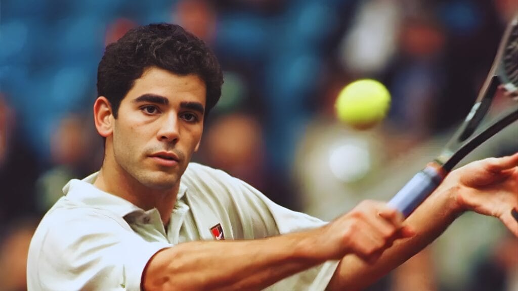 بيت سامبراس أثناء تأدية ضربة التنس المثالية، أحد أعظم لاعبي التنس في التاريخ، معروف بسرعته وقوة إرسالاته. صورة حصرية تظهر تركيزه العالي ومهاراته الاستثنائية على أرض الملعب، مثالية لمقالات عن أساطير التنس، أفضل لاعبي التنس في التاريخ، أو تحليلات المباريات الكبرى.