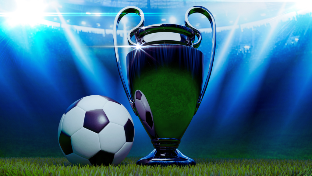 كأس أبطال أوروبا ذو الأذنين بجوار كرة في ملعب